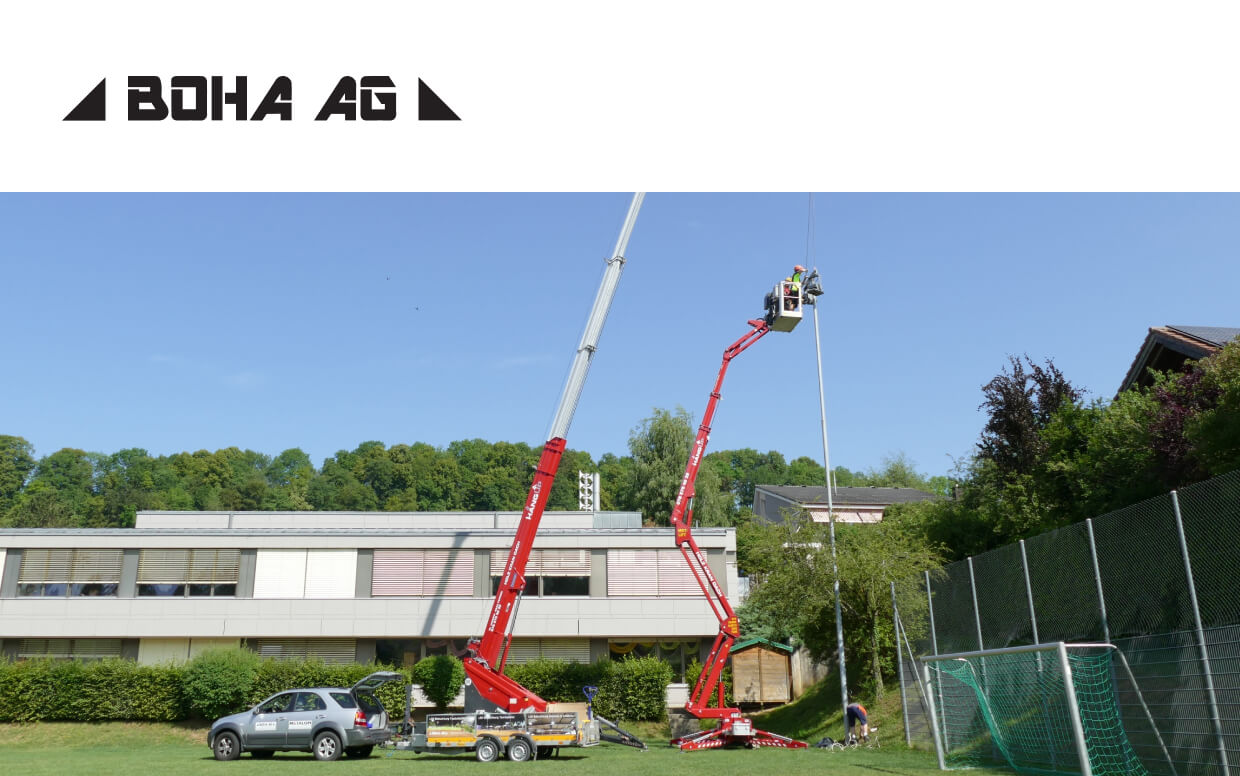 Abstrakte Darstellung der Webseite von BOHA AG beim Montieren einer LED-Leuchte.
